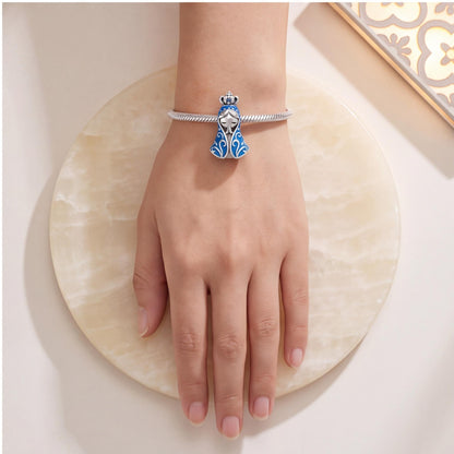 Blue Praying Virgin Mary Charm worn on a charm bracelet