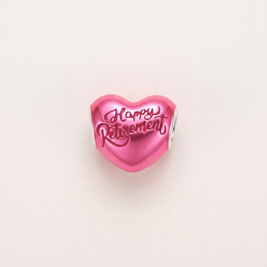 Happy Retirement Charm in 925 sterling silver with pink enamel, fits European-style charm bracelets