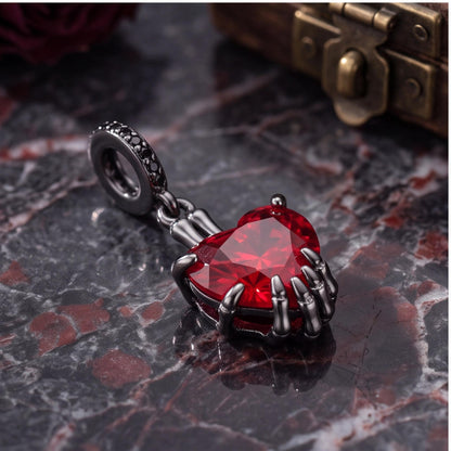 Skeleton Hand Heart Dangle worn on a charm bracelet