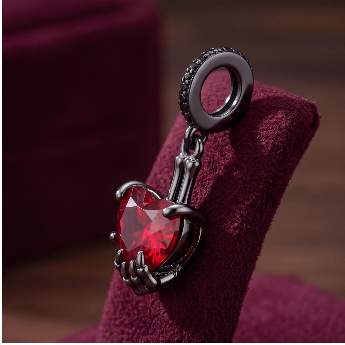 Skeleton Hand Heart Dangle on a silver charm bracelet